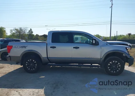 2018 Nissan Titan Pro-4X из США, поврежденный, VIN 1N6AA1E51JN551695